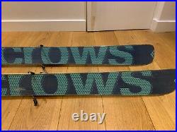 Black Crows Atris 108 skis with Marker Griffon bindings and matching poles